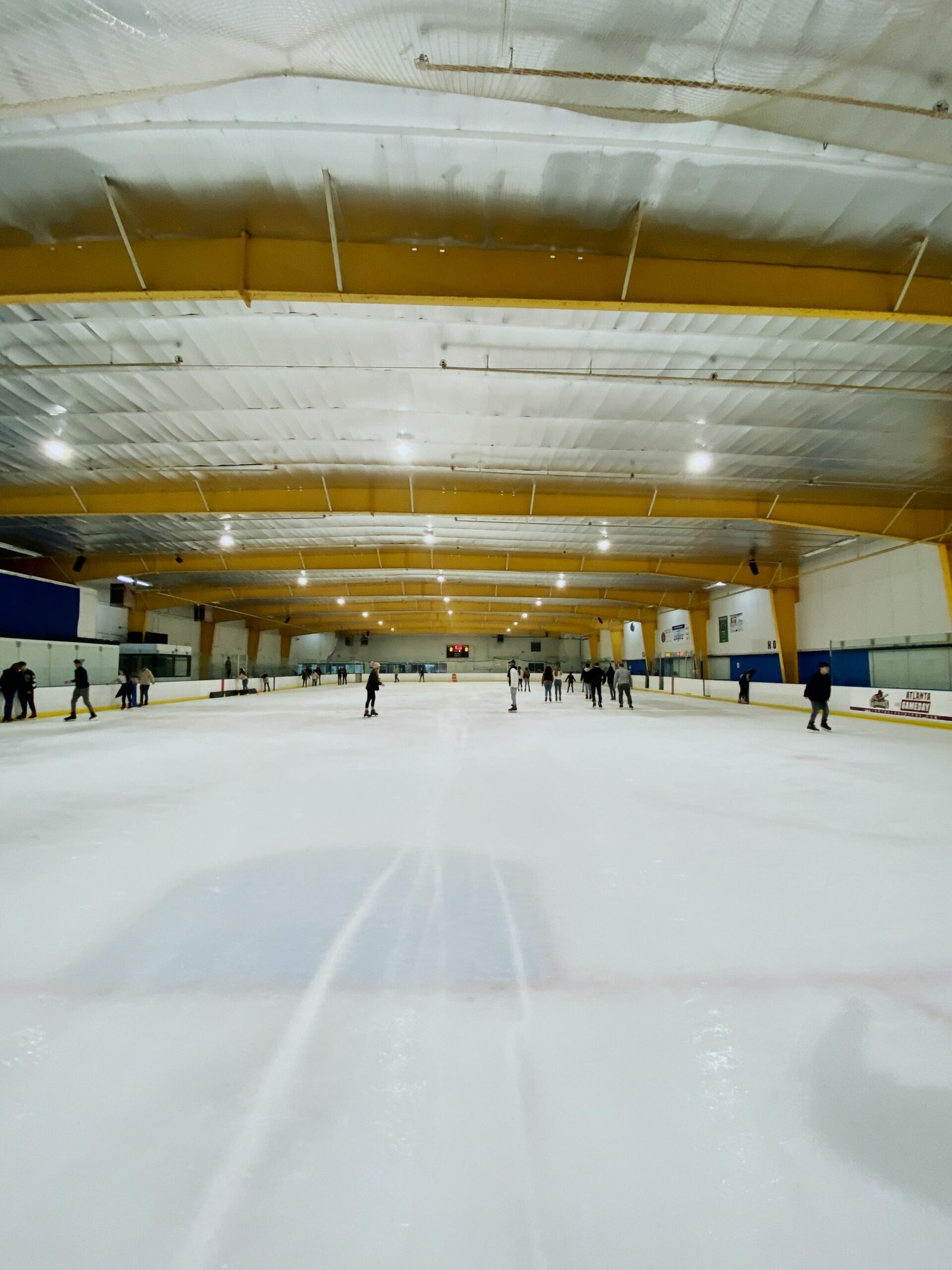 crowd on white ice rink